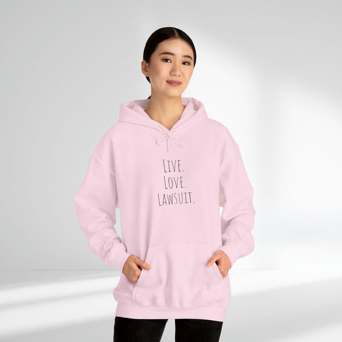 "Live. Laugh. Lawsuit." Statement Unisex Heavy Blend™ Hooded Sweatshirt - Hoodie