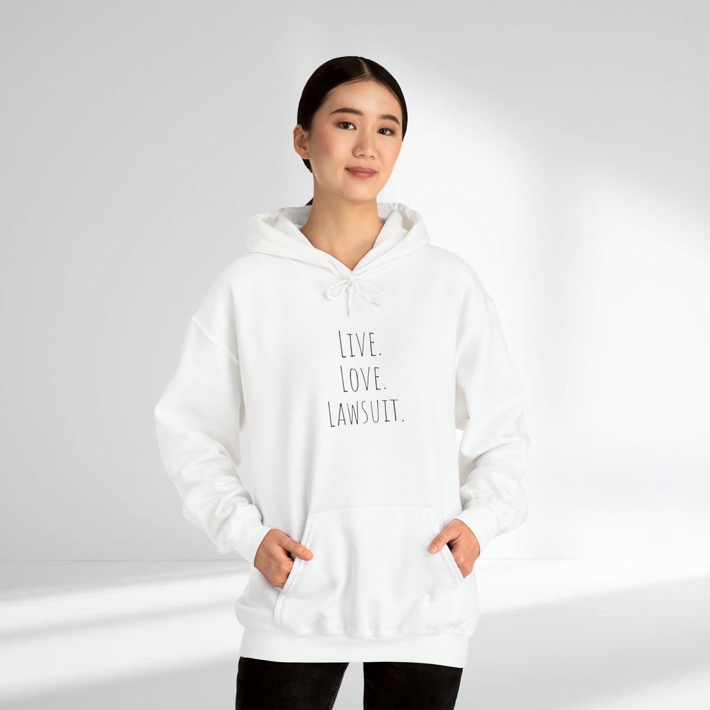 "Live. Laugh. Lawsuit." Statement Unisex Heavy Blend™ Hooded Sweatshirt - Hoodie