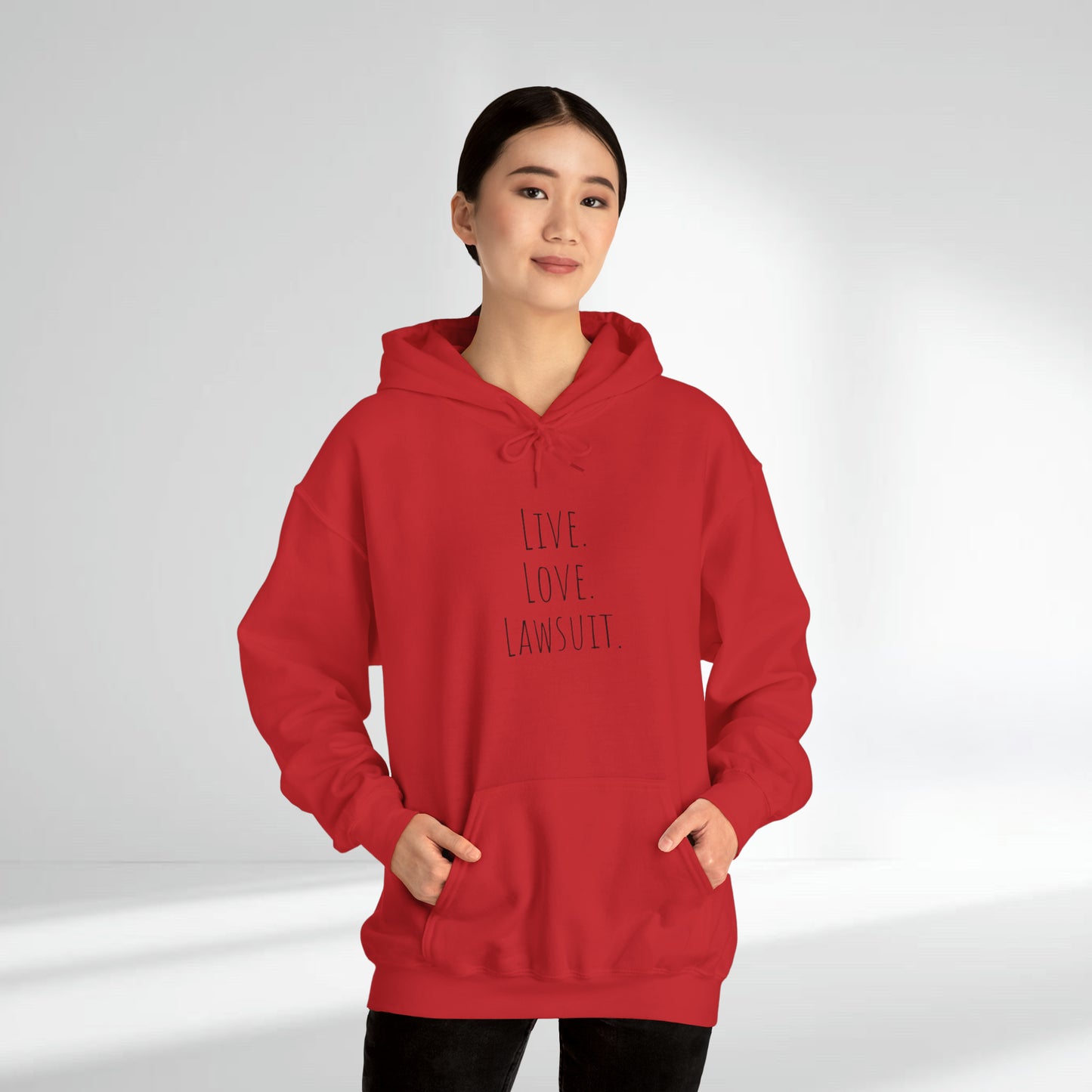 "Live. Laugh. Lawsuit." Statement Unisex Heavy Blend™ Hooded Sweatshirt - Hoodie