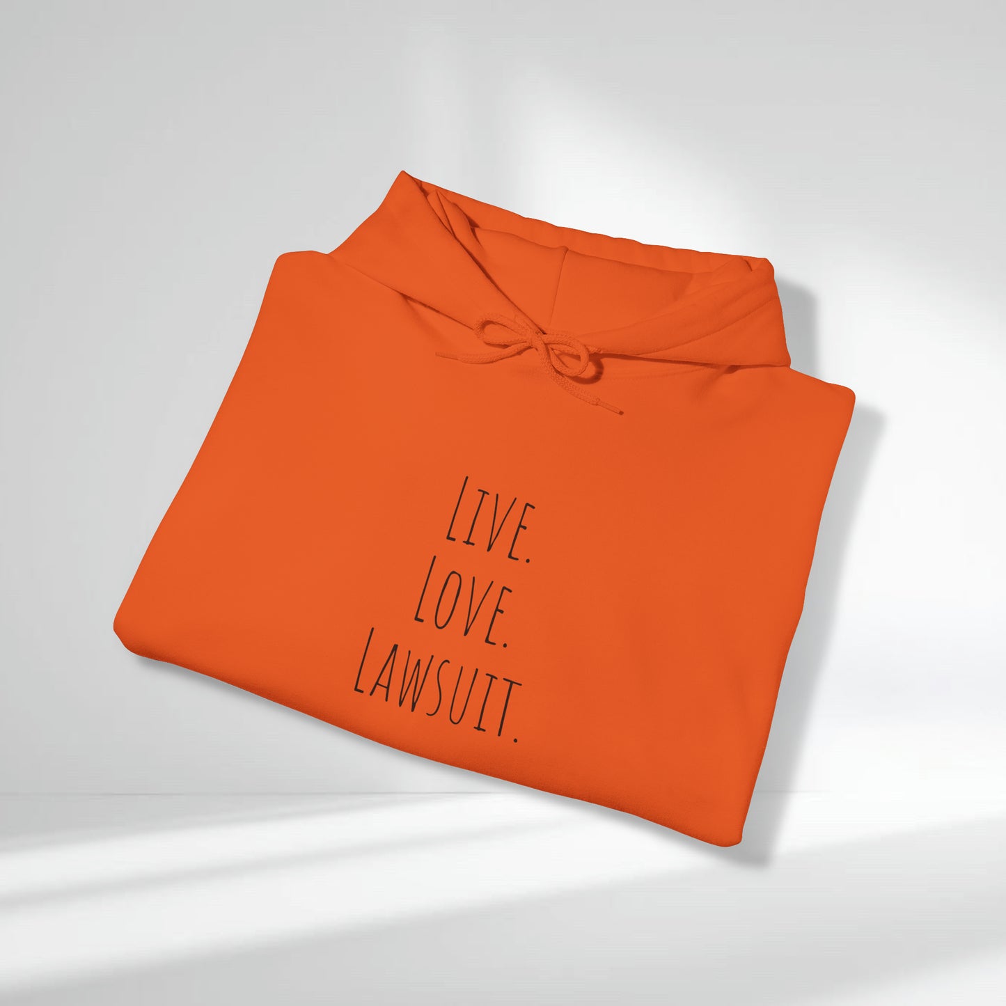 "Live. Laugh. Lawsuit." Statement Unisex Heavy Blend™ Hooded Sweatshirt - Hoodie