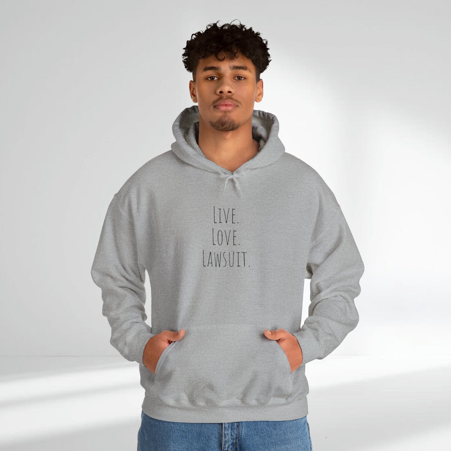 "Live. Laugh. Lawsuit." Statement Unisex Heavy Blend™ Hooded Sweatshirt - Hoodie