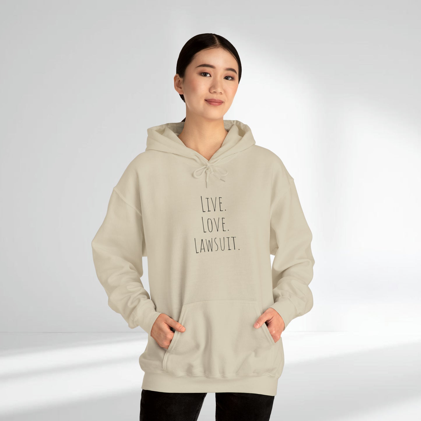 "Live. Laugh. Lawsuit." Statement Unisex Heavy Blend™ Hooded Sweatshirt - Hoodie