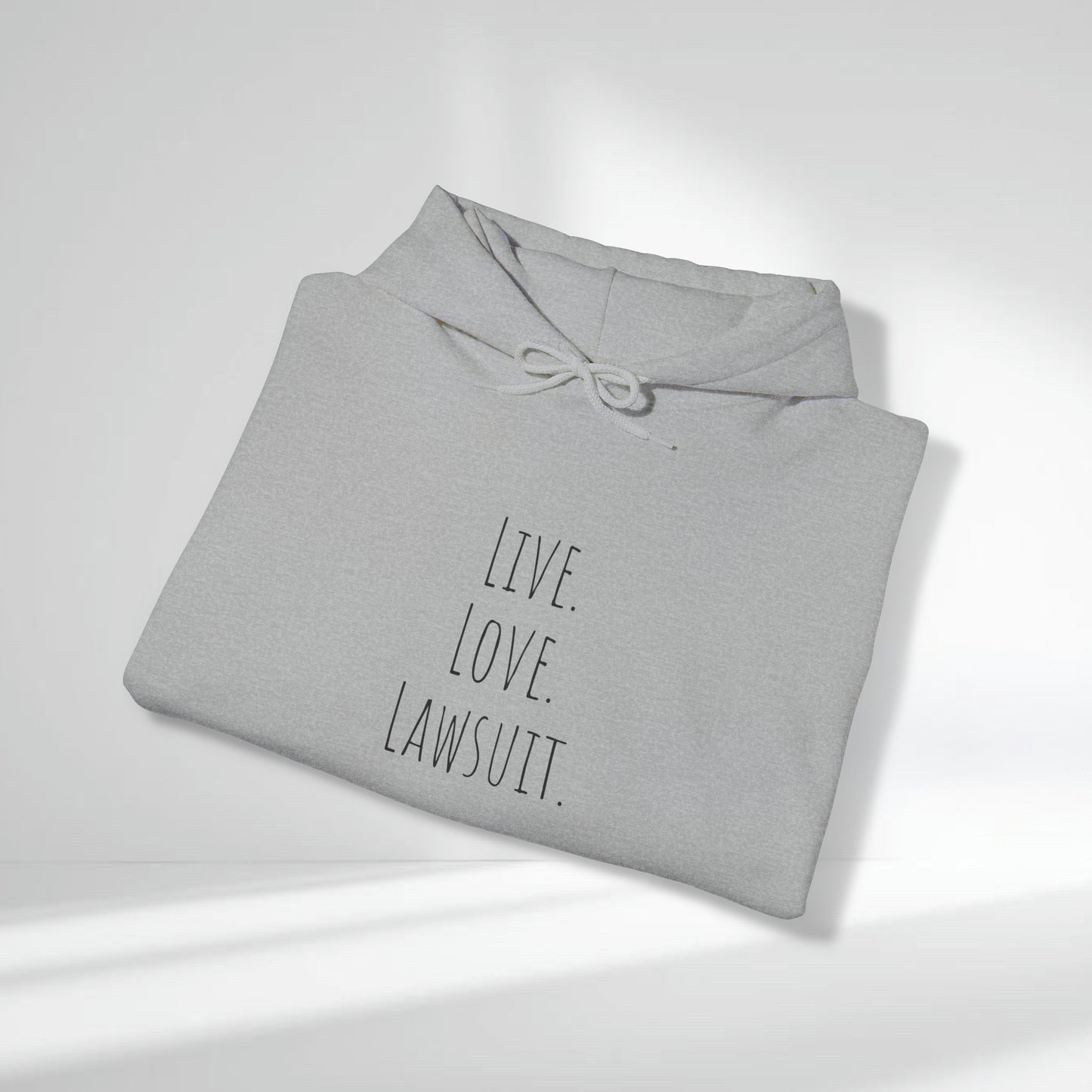 "Live. Laugh. Lawsuit." Statement Unisex Heavy Blend™ Hooded Sweatshirt - Hoodie